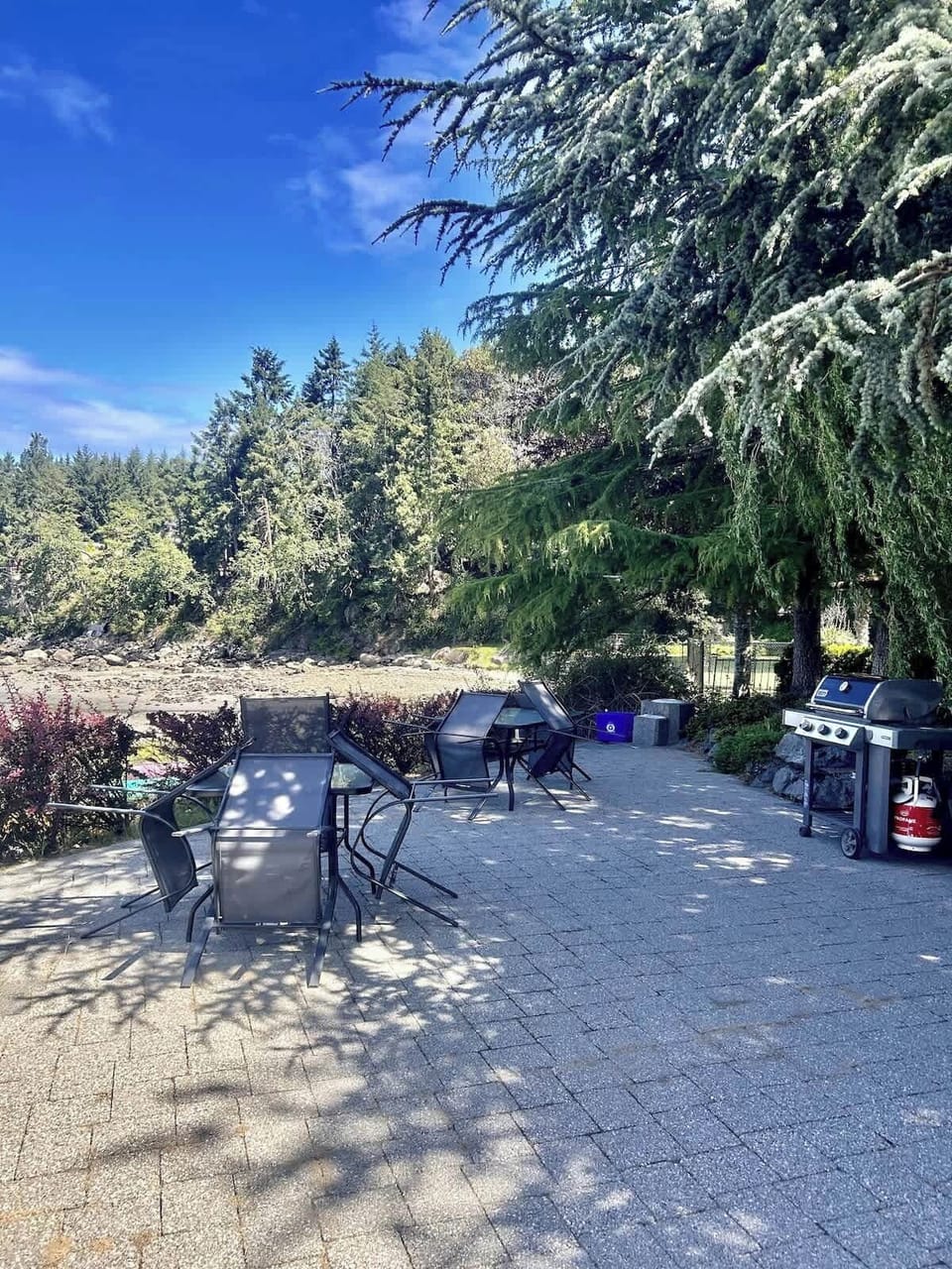 BBQ area located steps away from the room and located right on the water!