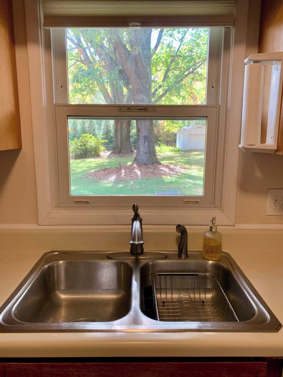 The kitchen window offers a great view of the magnificent trees.