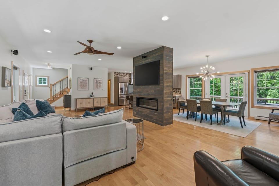 Living area anchored by double-facing fireplace