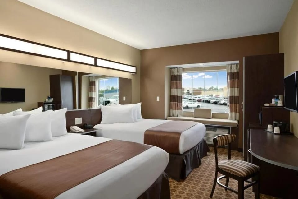 Recharge in two comfy beds with plenty of space around.