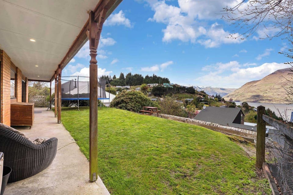 Patio with a View: Relax on the spacious patio overlooking stunning mountains and lush greenery!