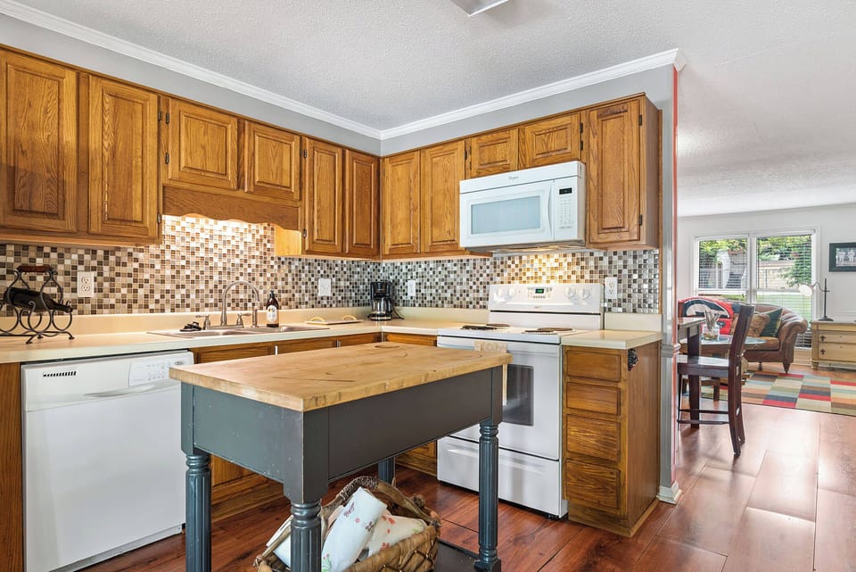 Well-equipped, comfortable kitchen filled with natural light