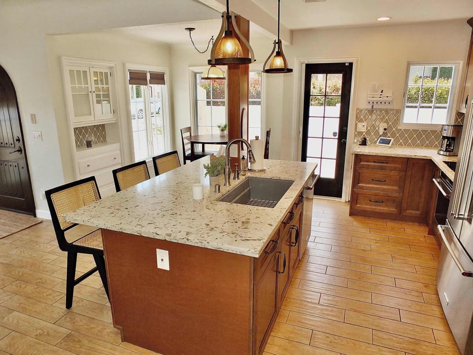 The warm, inviting kitchen offers ample space & every home comfort