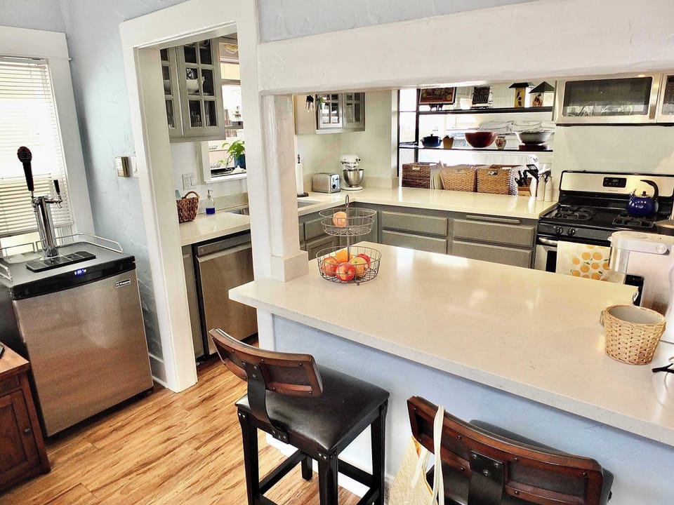 Sip morning coffee or grab a bite at the kitchen counter, with seating for 2