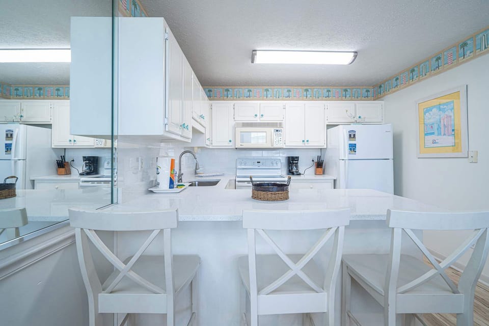 Kitchen bar counter with seating for 3