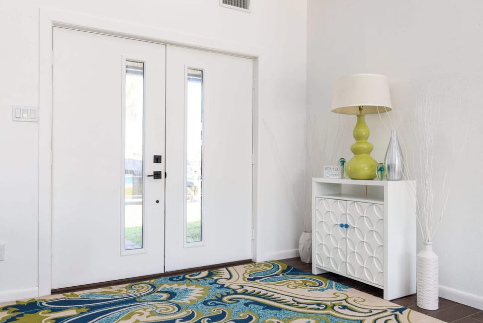 The airy, coastal vibes of this home will greet you as soon as you enter