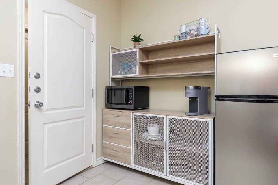 This 1st-floor queen suite boasts a private bath, Smart TV, kitchenette area, & deck access