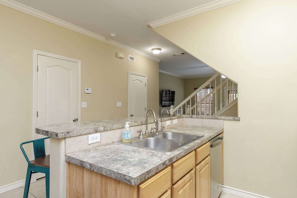 Sip morning coffee or grab a bite at the kitchen counter, with seating for 4
