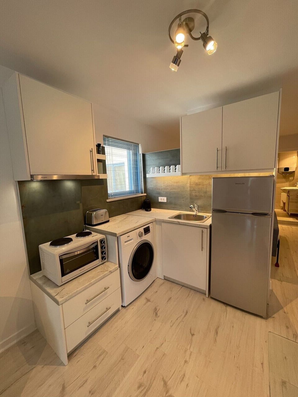 Modern kitchen equipped with essentials