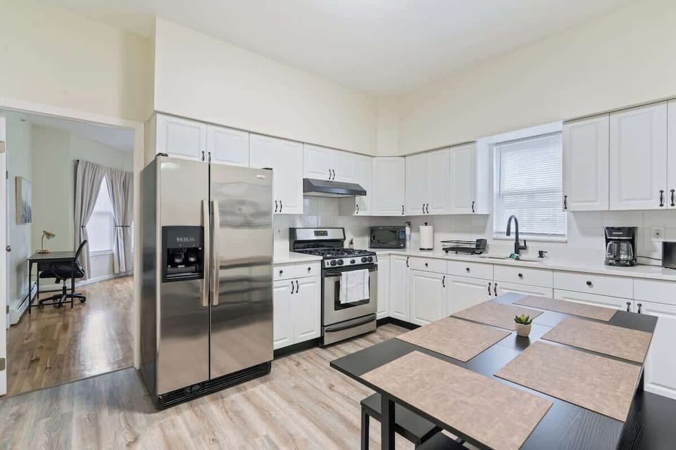 Fully equipped kitchen featuring modern appliances, cookware, and everything you need to prepare meals for your family or group.