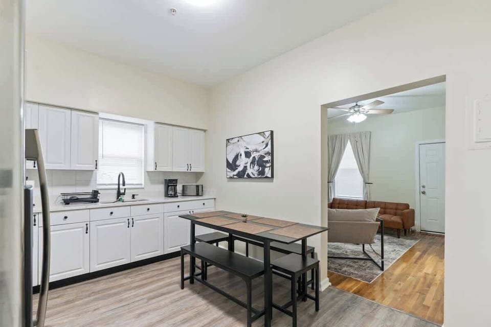 Enjoy meals at this cozy dining table for six, perfectly situated next to the fully equipped kitchen.