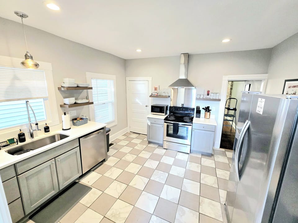 Large open kitchen with all the essentials for a home cooked meal. 