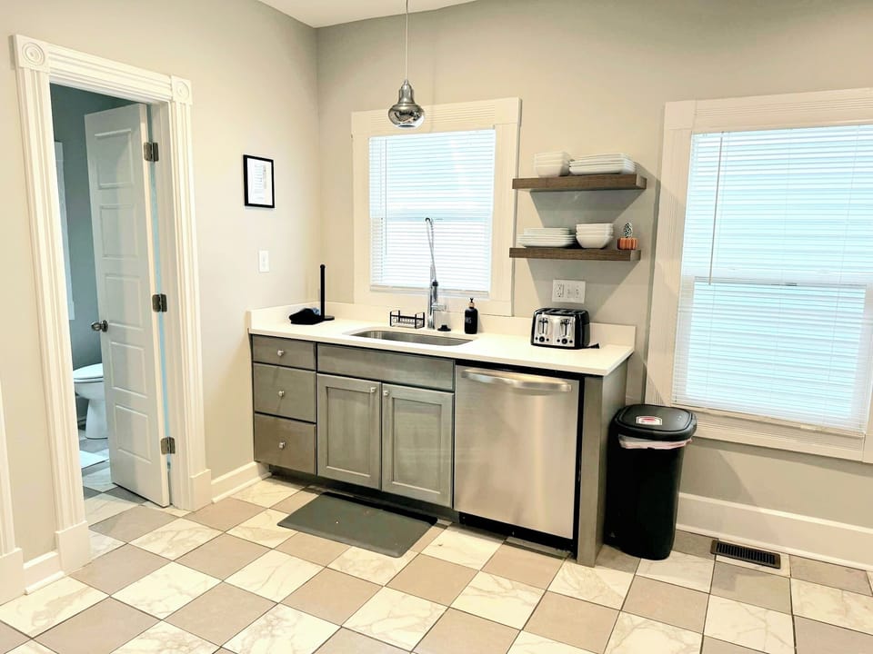 Large sink, garbage disposal, and toaster make cooking a breeze