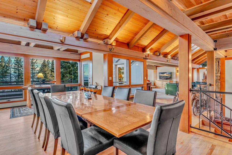 Dining Room: 10-person dining table, open layout to kitchen and living room
