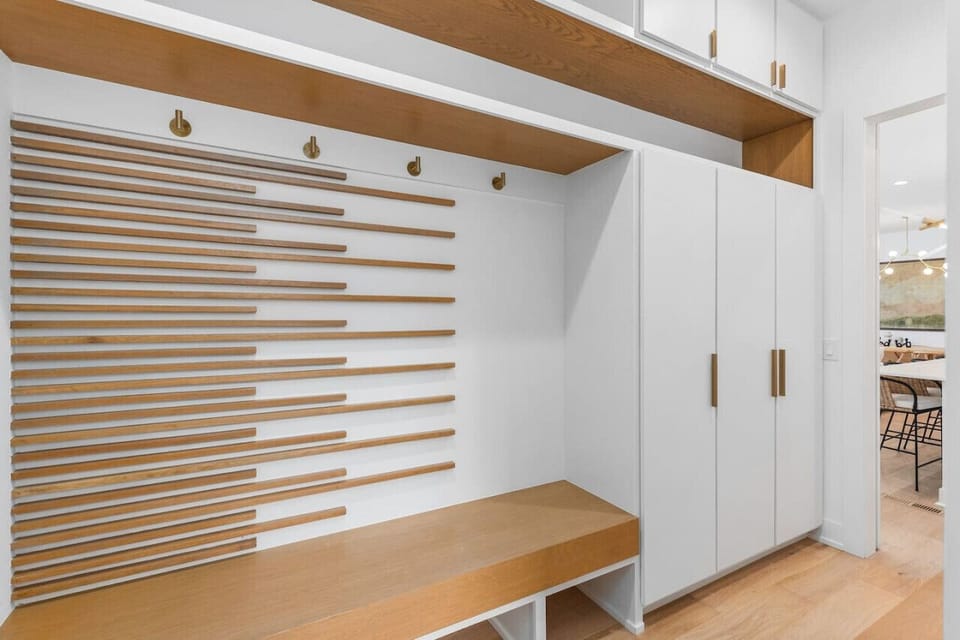 Plenty of storage and space next to the kitchen that can also be used as a spacious walk-in pantry.