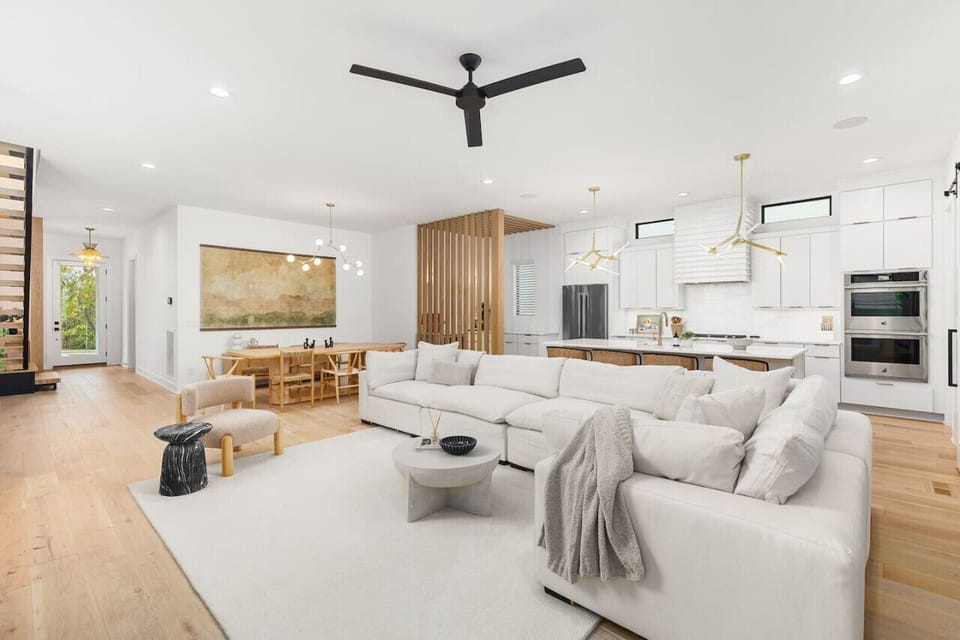 Spacious living room with lots of natural light and comfortable seating for your group. Smart TV with all the streaming apps and an easy-to-use gas fireplace for cozy nights in.