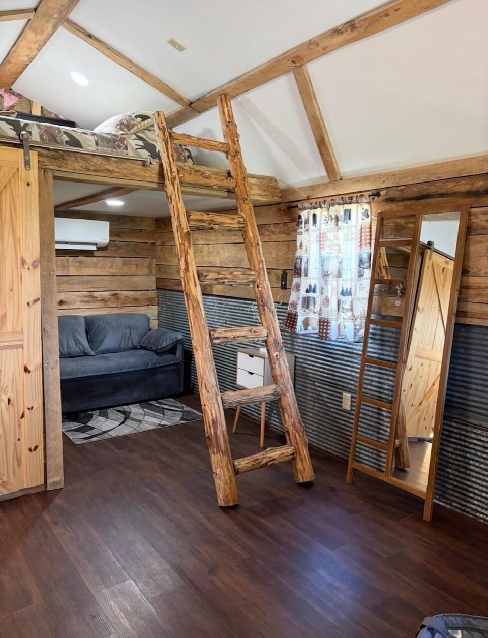 Queen pullout couch and sitting area.
