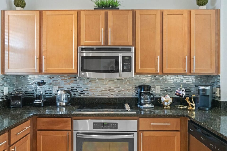 Fully equipped kitchen with beautiful backsplash#Disney #Parks #kingdom #springs #RegalOaks #resort #Apartment #Vacation #Rental #waterpark #Kissimmee #Orlando #universal #citywalk