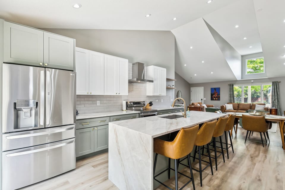 Spacious kitchen to gather and cook together. Spacious quartzite countertops.