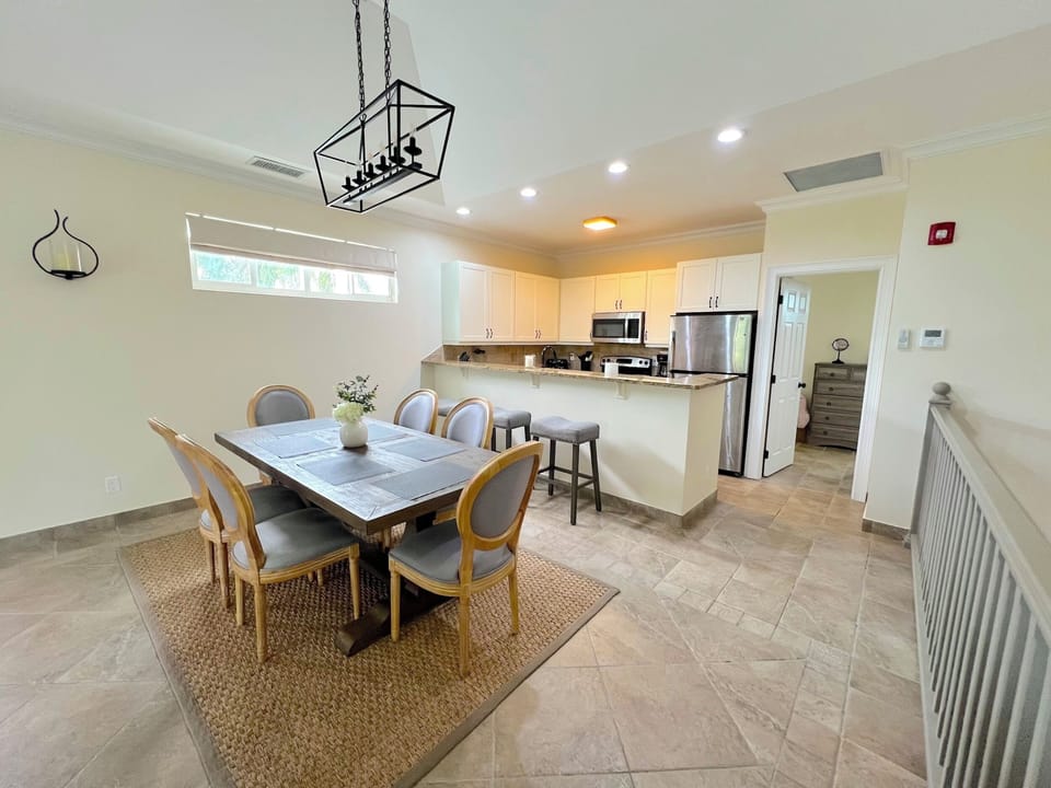 Open concept dining and kitchen on upper level