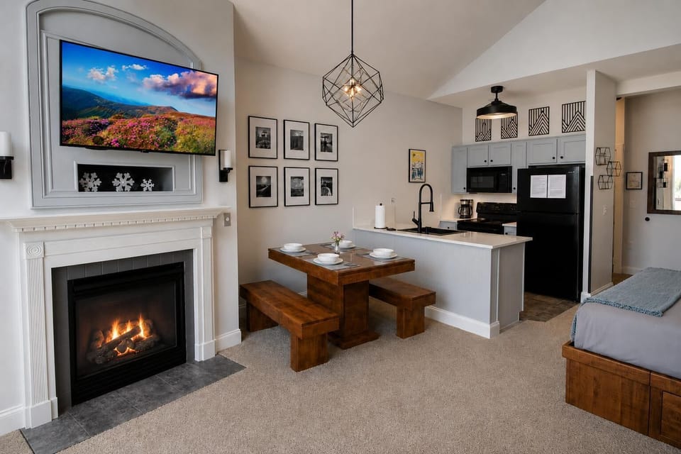 End your day with the warmth of the gas fireplace and relax after exploring the mountain.ounted TV in the studio’s open living space.