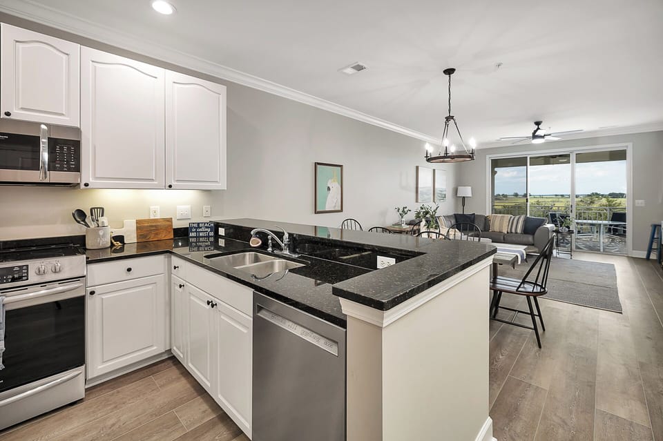 Given the open layout of the condo, the marsh can be seen from the kitchen. 