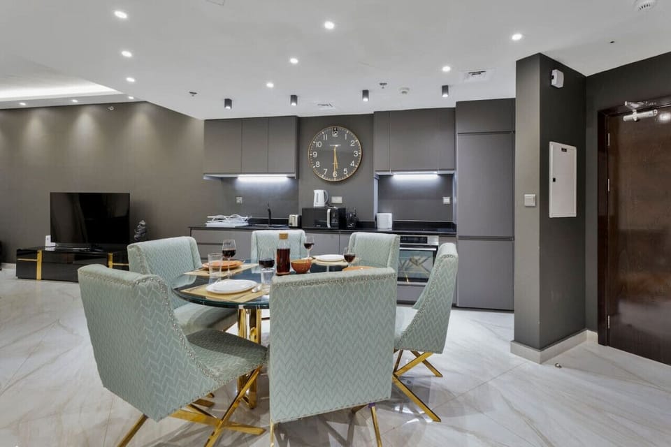 Dining: Elegant dining area with chic chairs, perfect for meals and laughter under the lights!