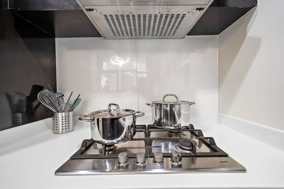 Kitchen: Sleek design with modern appliances for culinary adventures in Dubai!