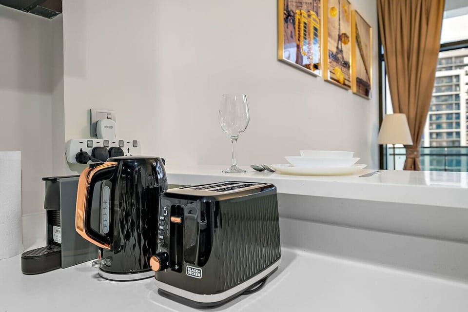 Kitchenette Delight: Modern appliances meet stylish decor for perfect meal prep moments!