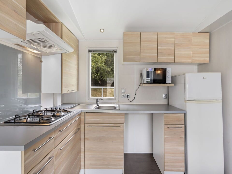 Kitchen, Countertop, Kitchen Appliance, Cabinetry, Major Appliance, Kitchen Sink, Sink, Wood, Plumbing Fixture, Furniture