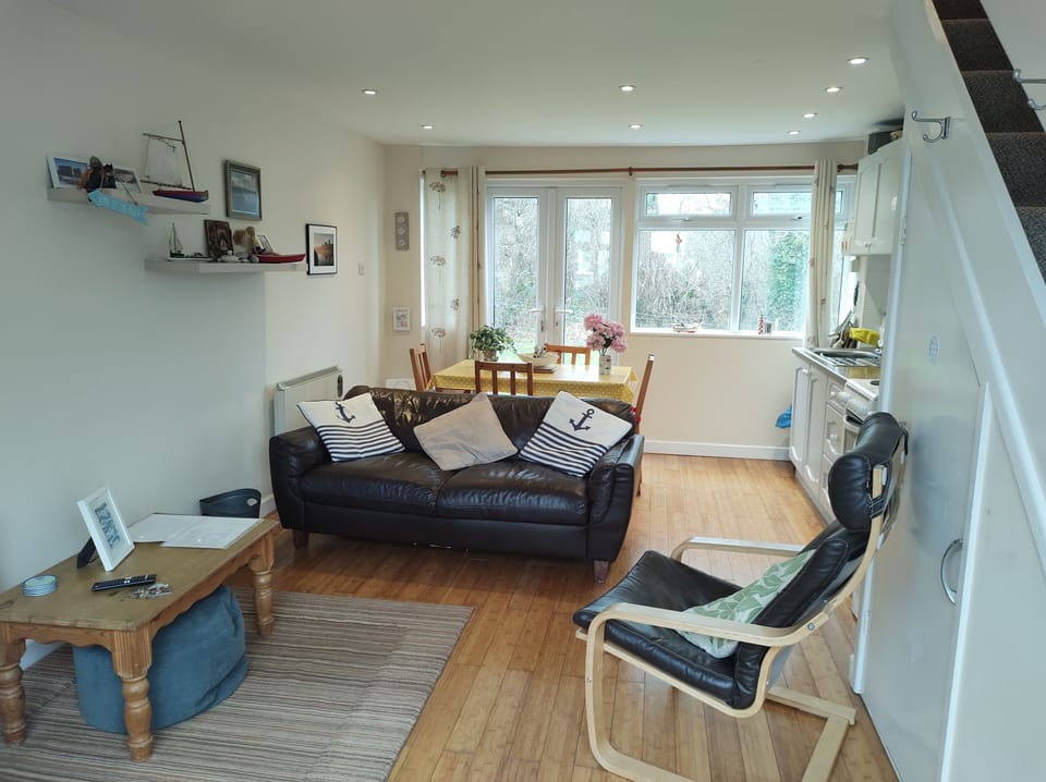 Lounge with dining area behind