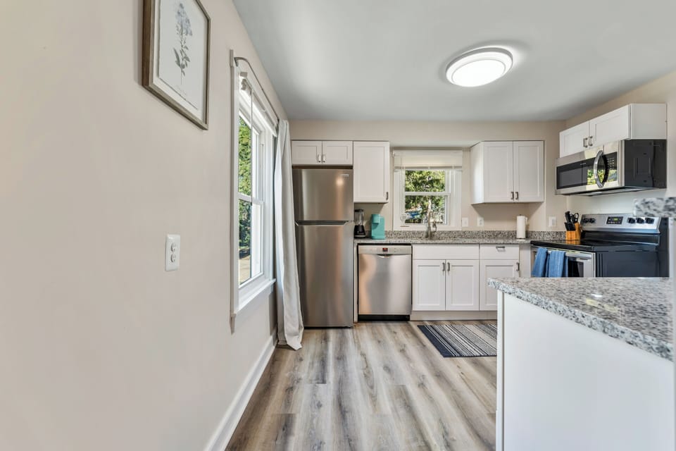 Cook up delicious meals in our sleek, modern kitchen, ready for your stay.