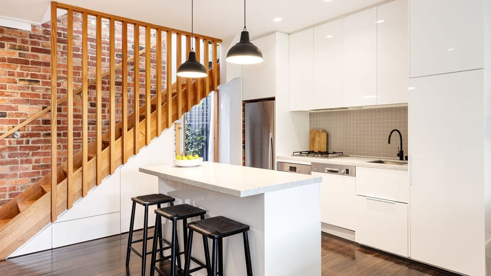 Kitchen with breakfast bar and seating for 3
