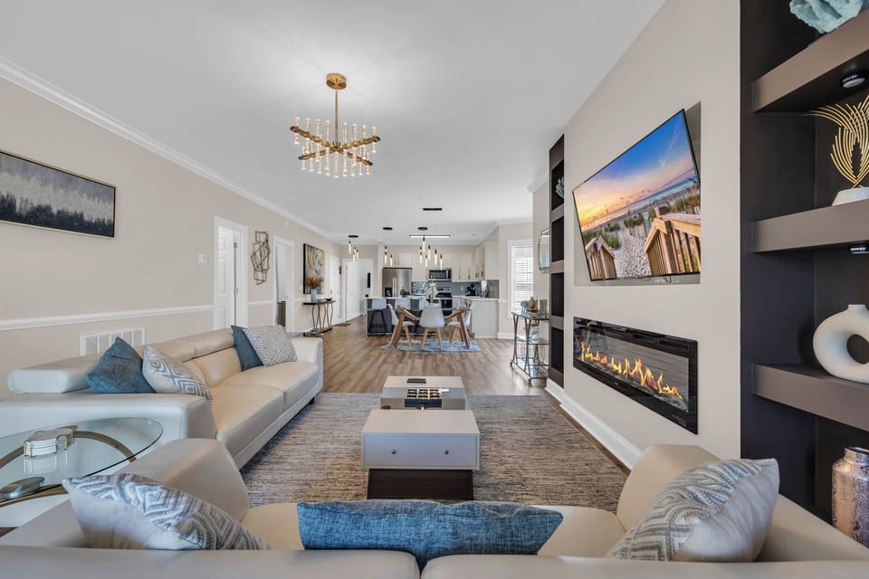 Modern living space with a sleek indoor fireplace centerpiece.
