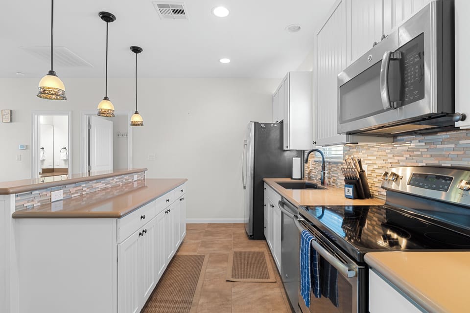 Modern kitchen with stainless steel appliances and all essentials!