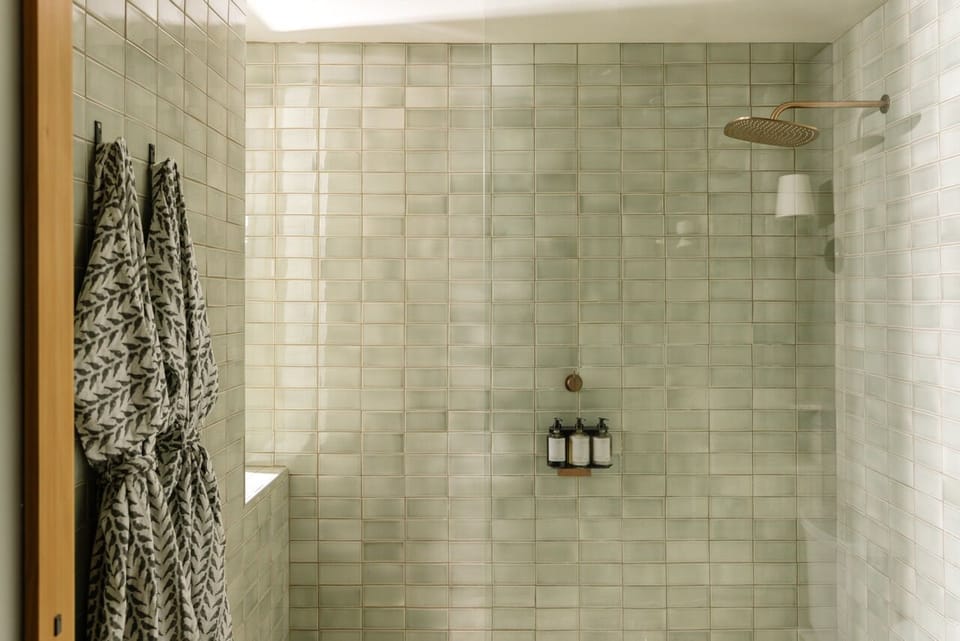 Rinse off under the rainfall shower for a soothing reset.