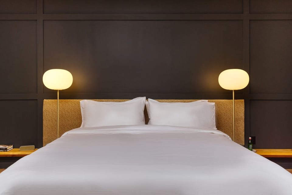 Sink into crisp linens for a perfectly restful night’s sleep.