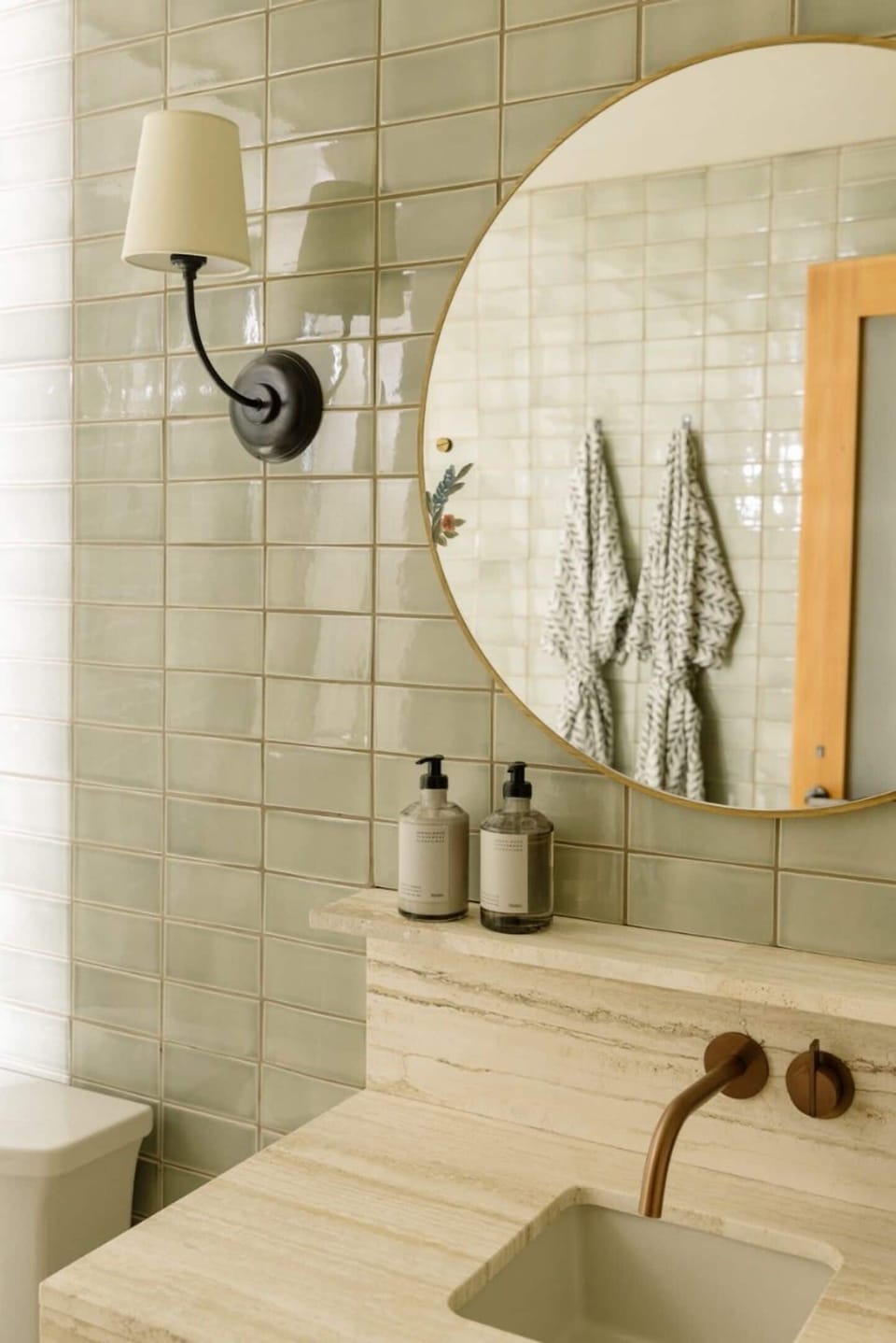 Refresh at the elegant vanity with warm, spa-like lighting.