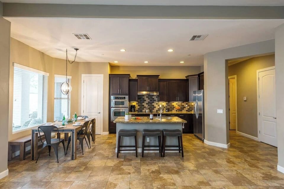 Spacious kitchen and dining area, seamlessly connected for easy meal prep and shared dining