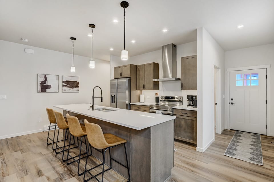 Modern kitchen with stainless steel appliances for all your culinary needs!