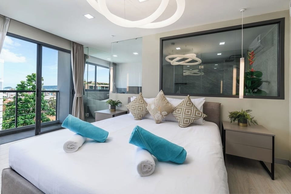 Super comfortable King Bed in Master bedroom 1 with Balcony and ensuite bathroom.