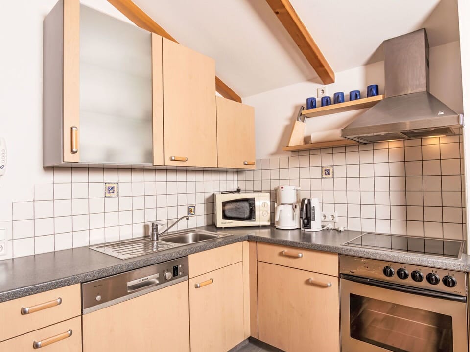 Cabinetry, Countertop, Tap, Property, Kitchen Sink, Sink, Furniture, Building, Kitchen Stove, Plumbing Fixture