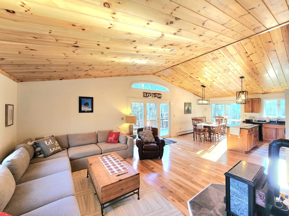 Open concept living/dining room. The fireplace is decorative only.