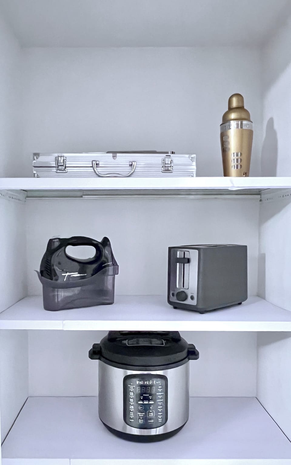 In the kitchen pantry you can find an Instapot, hand mixer, toaster & BBQ utensils. Also, provided is a shaker & bar tools which you can often find on the shelves in the kitchen.