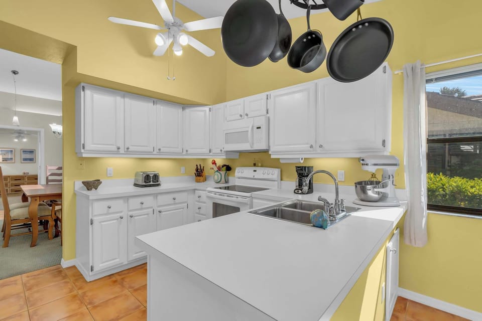 There is a good sized counter in the kitchen and plenty of pots and pans to use 