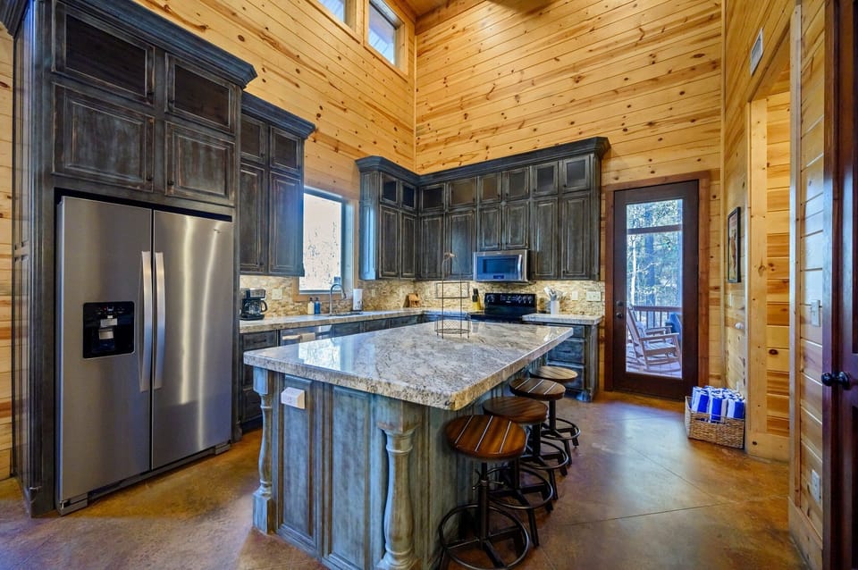 [Main level: Kitchen] Fully equipped kitchen w/ dishes, cookware, drip/pour over