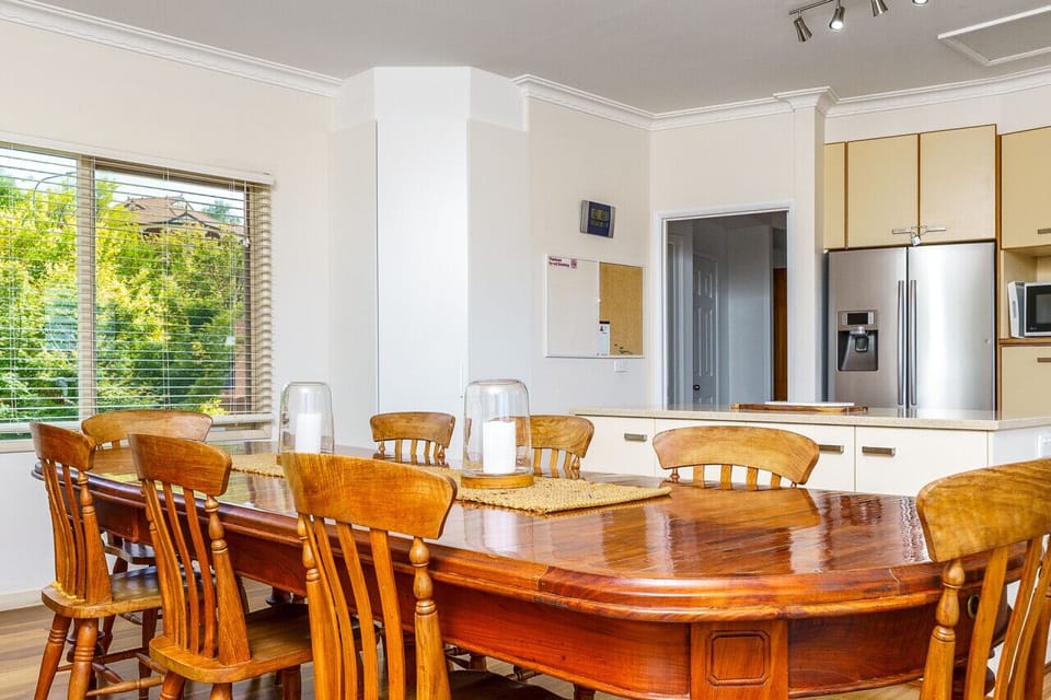 A generous 8-seater dining table designed for comfort and style.