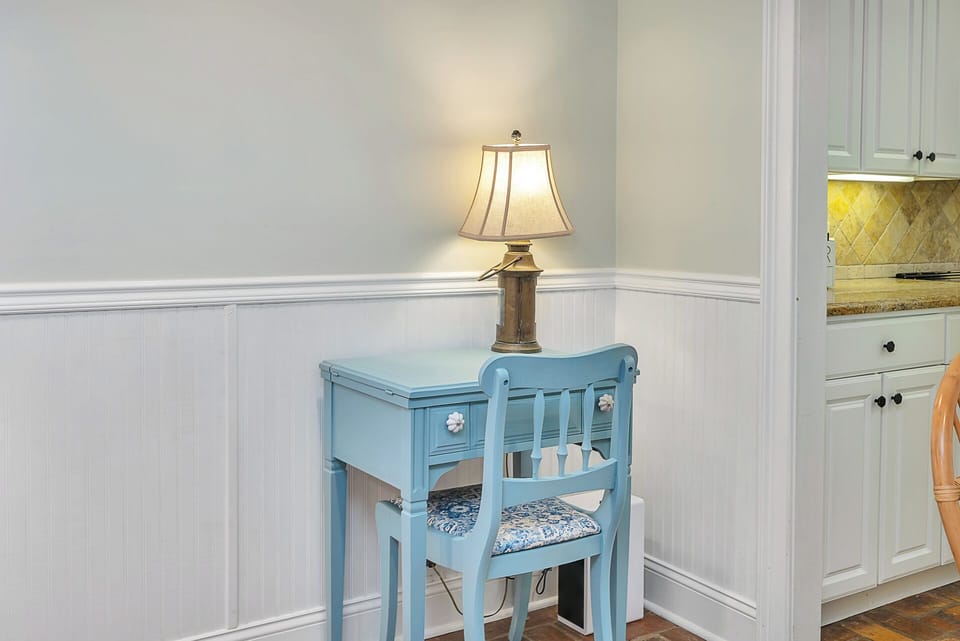 A cute, vintage blue desk for an extra workspace
