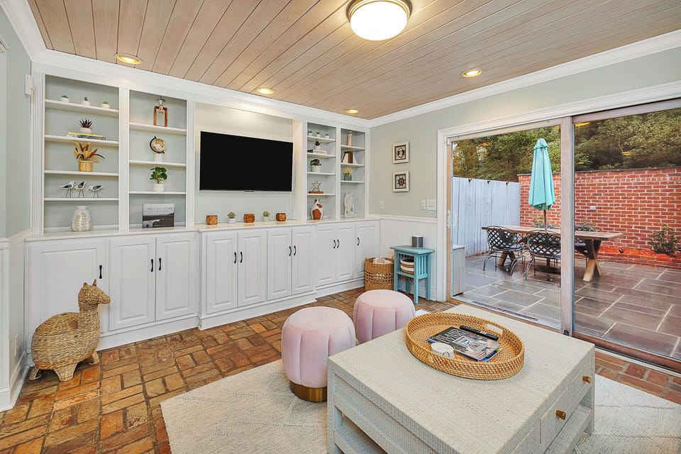 Lovingly decorated living room with a smart TV.