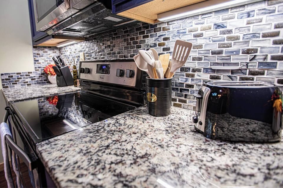  Fully stocked kitchen with granite counters & charming Smoky Mountain style